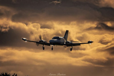 A Cessna 421 arriving at Victoria International Airport at dawn. Photo by Aaron Burton (Instagram user @burtonader)