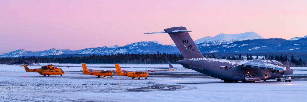 RCAF Globemaster and Twin Otters on ramp