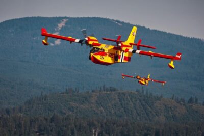 Bridger Aerospace Scooper 284 and 285 climbing out of Priest Lake in northern Idaho while battling the Consalus Fire. Photo submitted by Ashton Heyliger, Instagram user @airside_ash