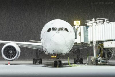 A WestJet Boeing 787 Dreamliner under snow at Vancouver International Airport. Tagged on Instagram by c7_avphotography